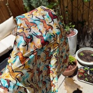 Southwestern silk scarf with horse and sun designs